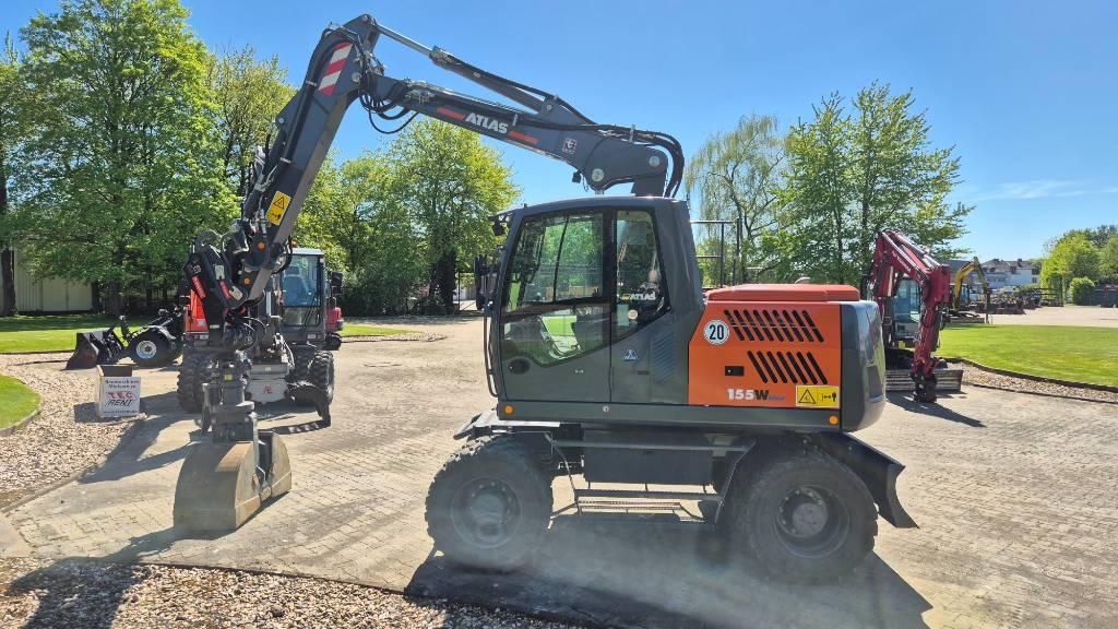Atlas 155W mit OilQuick OQ65 Mobilbagger